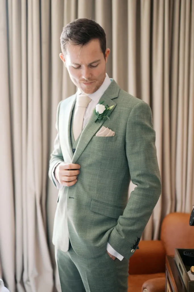 Elegant wedding portrait of a groom at wine & Books Hotel, Lisbon.