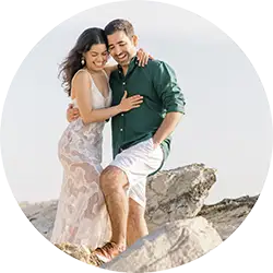 Happy and smiling engaged couple during a pre-wedding photo session on the island of Baleal in Peniche.