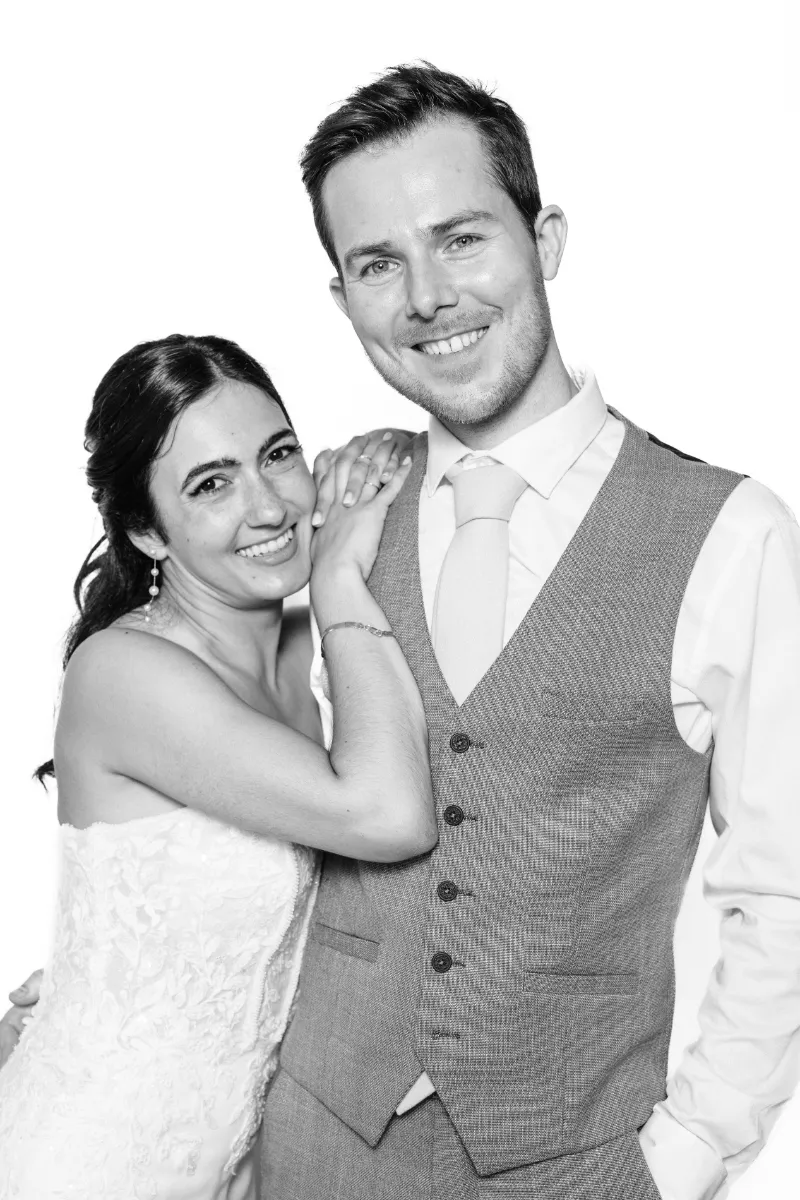 Elegant couple posing with a fashion magazine attitude in the Portrait Station photographic studio during their wedding party in Portugal.